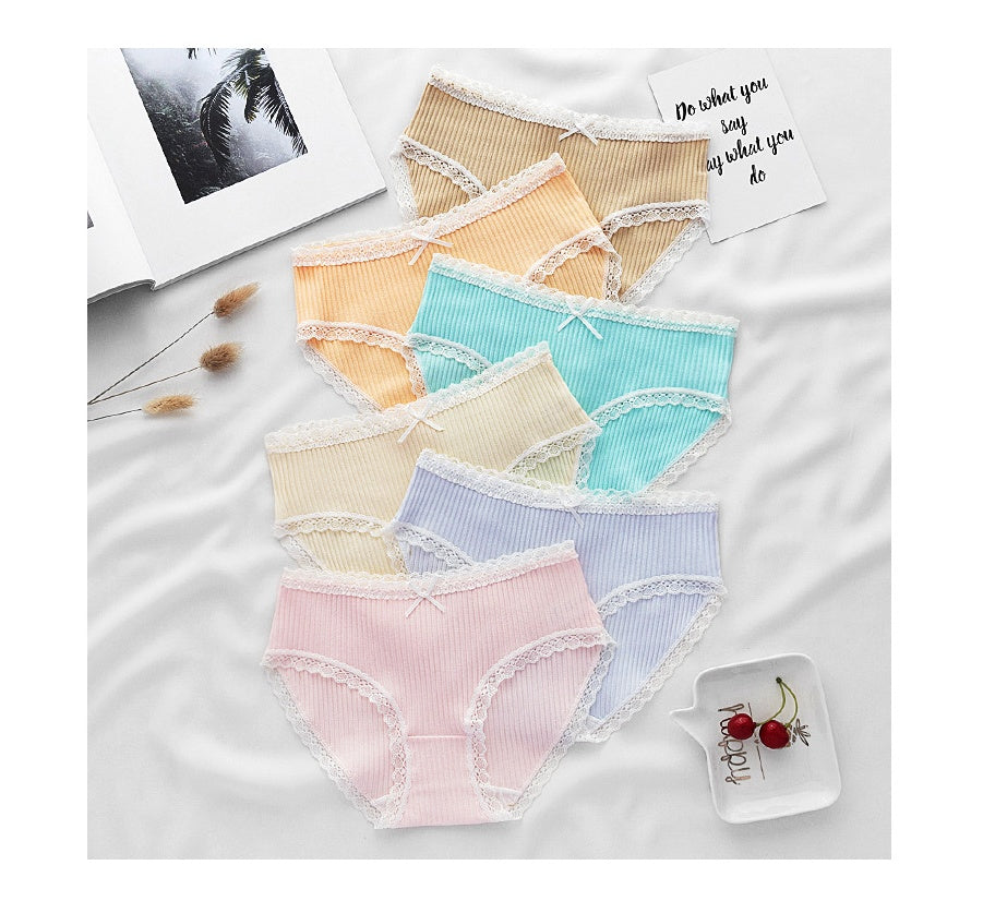 Women underwears set in vibrant colors, featuring soft, breathable fabric and lace trim for all-day comfort.