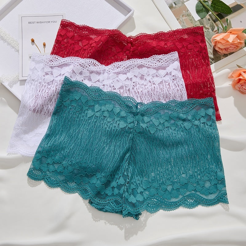 Women Panties in red lace with a seamless design, showcasing a comfortable and stylish fit.